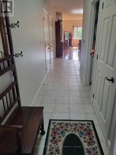 Ceramic floors bring elegance to your entry - 5 - 16 Lane Avenue, Belleville (Belleville Ward), ON - Indoor Photo Showing Other Room