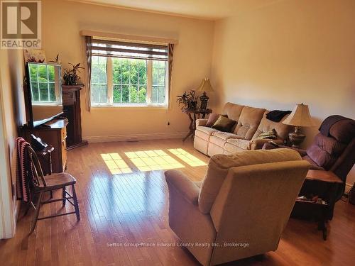 Cozy, bright living room with corner gas fireplace - 5 - 16 Lane Avenue, Belleville (Belleville Ward), ON - Indoor Photo Showing Living Room