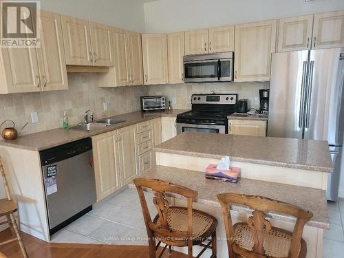 Open kitchen has great counter space - 5 - 16 Lane Avenue, Belleville (Belleville Ward), ON - Indoor Photo Showing Kitchen With Double Sink
