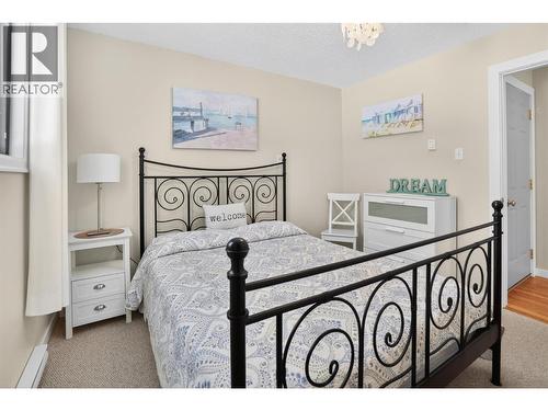 8110 & 8120 Busk Road, Balfour, BC - Indoor Photo Showing Bedroom