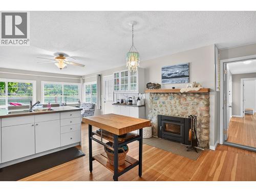 8110 & 8120 Busk Road, Balfour, BC - Indoor With Fireplace