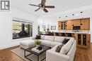 Image Staged-  White paint included in asking price - 1601 Tower Ranch Boulevard, Kelowna, BC  - Indoor Photo Showing Living Room 