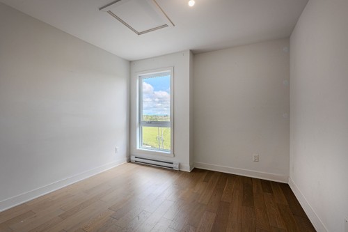 Chambre à coucher - 204-9265 Boul. De La Grande-Allée, Mirabel, QC - Indoor Photo Showing Other Room