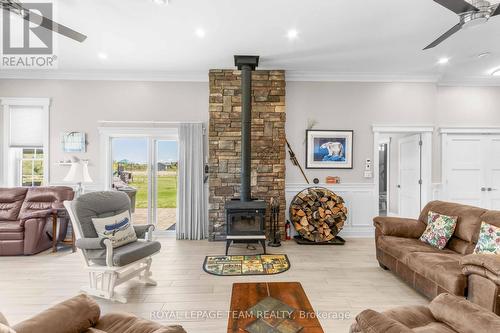 43 Green Gate Lane, North Algona Wilberforce, ON - Indoor Photo Showing Living Room With Fireplace