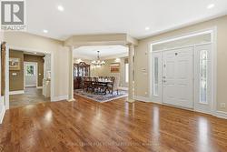 Formal Dining Room Features a Coffered Ceiling - 