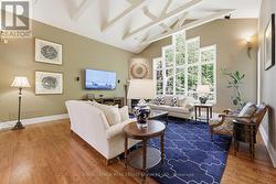 Dramatic Living Room with a Corner Gas Fireplace - 