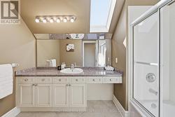 Four-Piece Bathroom with Skylight - 