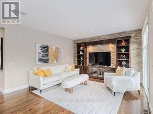 105 Black Maple Private, Ottawa, ON - Indoor Photo Showing Living Room With Fireplace