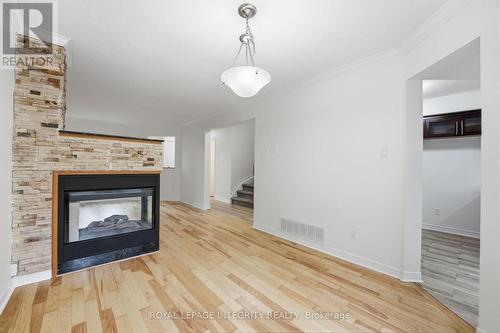 76 Hunterswood Crescent, Ottawa, ON - Indoor Photo Showing Living Room With Fireplace