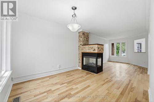 76 Hunterswood Crescent, Ottawa, ON - Indoor Photo Showing Living Room With Fireplace