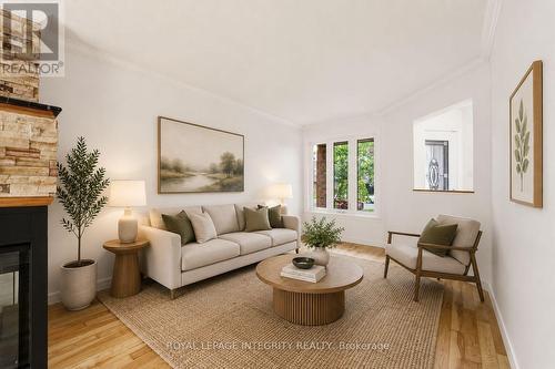 76 Hunterswood Crescent, Ottawa, ON - Indoor Photo Showing Living Room With Fireplace