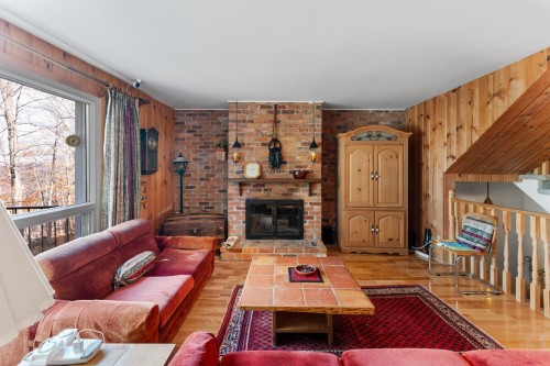 Salle familiale - 1697 Ch. Du Mont-Gabriel, Sainte-Adèle, QC - Indoor Photo Showing Living Room With Fireplace