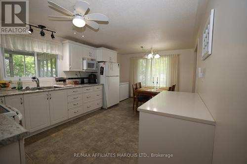 9 Sutton Drive, Edwardsburgh/Cardinal, ON - Indoor Photo Showing Kitchen With Double Sink