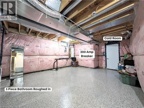 Basement featuring an exposed joist ceiling, insulated walls, polished concrete flooring, and roughed-in plumbing for a 3-piece bathroom - 37 Mull Avenue, Caledonia, ON - Indoor Photo Showing Basement