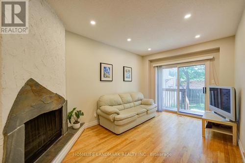 7 - 3345 Silverado Drive, Mississauga, ON - Indoor Photo Showing Living Room With Fireplace