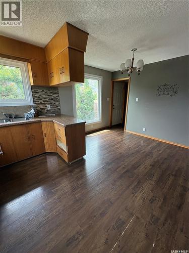 660 Alberta Avenue, Foam Lake, SK - Indoor Photo Showing Kitchen With Double Sink