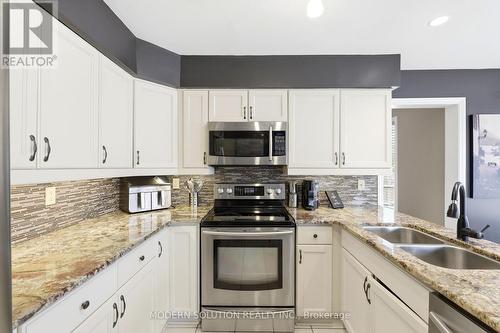 198 Pine Valley Drive, London South, ON - Indoor Photo Showing Kitchen With Double Sink