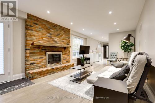 Guest Suite w/ kitchen + bathroom - 3 Burton Grove, King, ON - Indoor Photo Showing Living Room With Fireplace