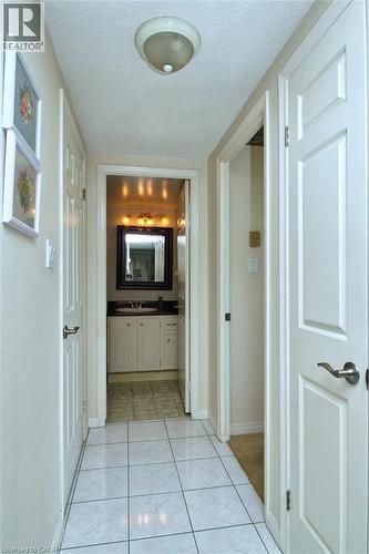 From foyer towards 2 bedrooms and bath - 40 Harrisford Street Unit# 802, Hamilton, ON 