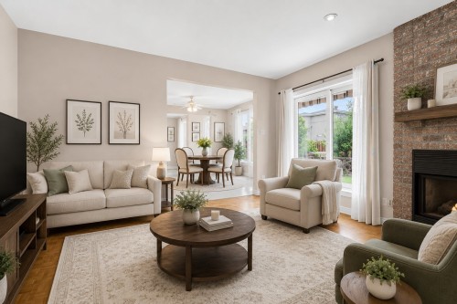 Family Room - 204 Rue Maupassant, Dollard-Des-Ormeaux, QC - Indoor Photo Showing Living Room With Fireplace