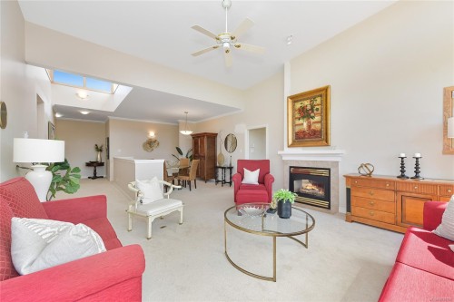 #403-5327 Cordova Bay Rd, Saanich, BC - Indoor Photo Showing Living Room With Fireplace