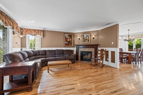 Salon - 84 Rue De Sorel, Blainville, QC - Indoor Photo Showing Living Room With Fireplace