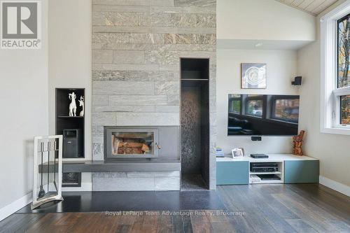 Efficiant Wood Burning Fireplace - 34 Beechwood Lane, Seguin, ON - Indoor Photo Showing Living Room With Fireplace