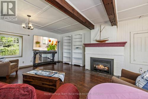 121 Rattlebear Drive, The Archipelago (Archipelago North), ON - Indoor Photo Showing Living Room With Fireplace