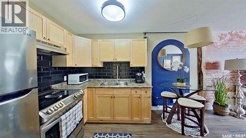 2 2358 Rae Street, Regina, SK - Indoor Photo Showing Kitchen With Double Sink