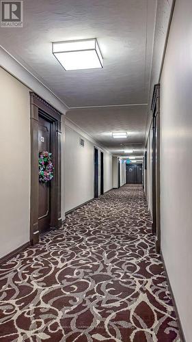 Corridor to condo units - 802 - 40 Harrisford Street, Hamilton, ON - Indoor Photo Showing Other Room