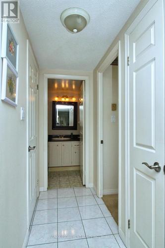 Hallway from foyer towards 2 bedrooms and bath - 802 - 40 Harrisford Street, Hamilton, ON - Indoor Photo Showing Other Room