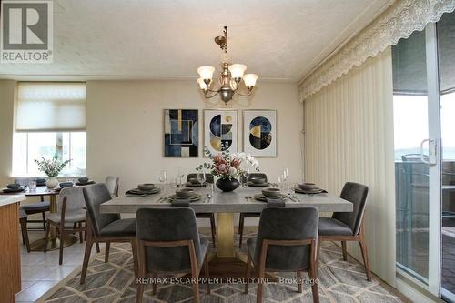 Dining area Virtually Staged - 802 - 40 Harrisford Street, Hamilton, ON - Indoor Photo Showing Dining Room