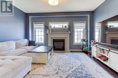 79 Jevons Drive, Ajax, ON - Indoor Photo Showing Living Room With Fireplace