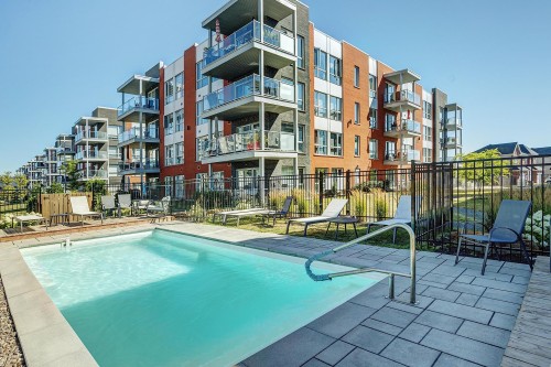 Pool - 406-50 Rue Toe-Blake, Vaudreuil-Dorion, QC - Outdoor With In Ground Pool With Balcony