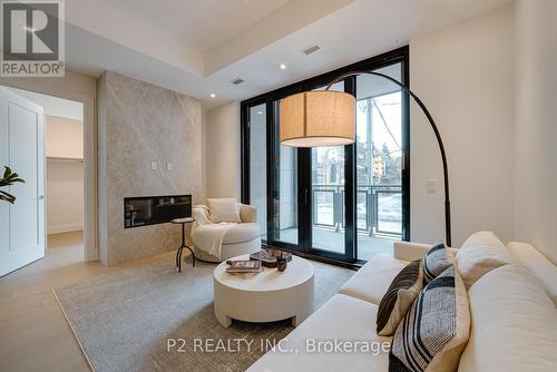 208 - 2 Forest Hill Road, Toronto, ON - Indoor Photo Showing Other Room With Fireplace