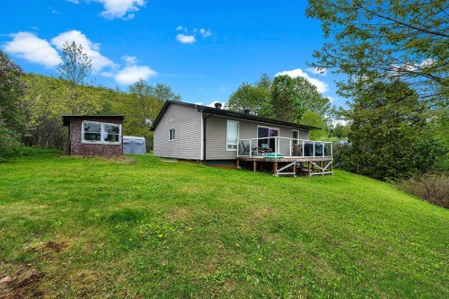 Face arrière - 384 Ch. Du Lac-De-La-Truite, Mansfield-Et-Pontefract, QC - Outdoor With Deck Patio Veranda