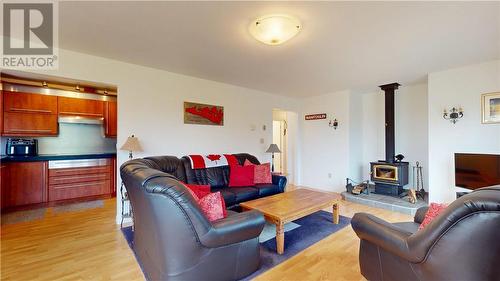 12 Islandview, Mindemoya, ON - Indoor Photo Showing Living Room With Fireplace
