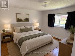 Main Floor Bedroom #1 *virtually staged - 