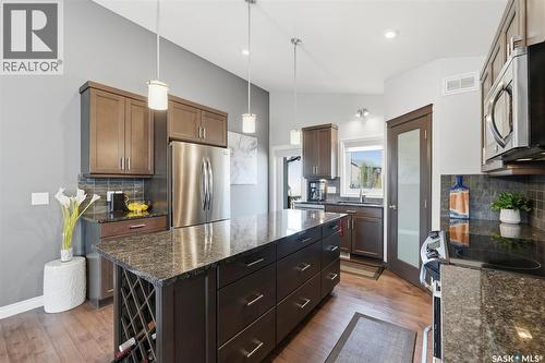 711 Sutter Crescent, Saskatoon, SK - Indoor Photo Showing Kitchen With Upgraded Kitchen