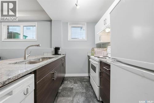 711 Sutter Crescent, Saskatoon, SK - Indoor Photo Showing Kitchen With Double Sink