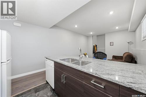711 Sutter Crescent, Saskatoon, SK - Indoor Photo Showing Kitchen With Double Sink