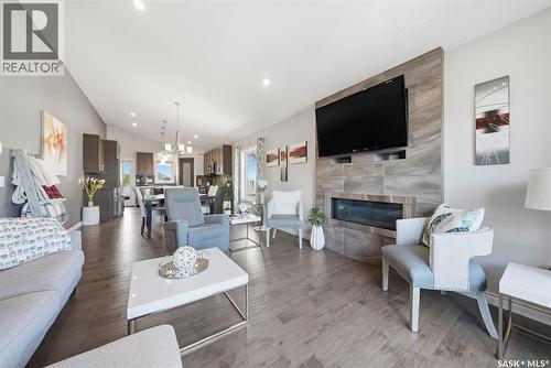 711 Sutter Crescent, Saskatoon, SK - Indoor Photo Showing Living Room With Fireplace