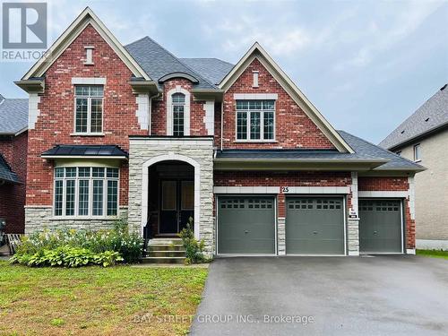 25 Mcisaac Drive, Springwater, ON - Outdoor With Facade