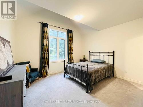 25 Mcisaac Drive, Springwater, ON - Indoor Photo Showing Bedroom