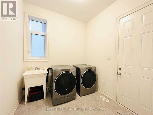 25 Mcisaac Drive, Springwater, ON - Indoor Photo Showing Laundry Room