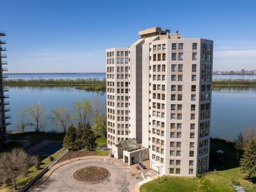 Front of Structure - 1005-8050 Boul. St-Laurent, Brossard, QC - Outdoor With Body Of Water With Facade