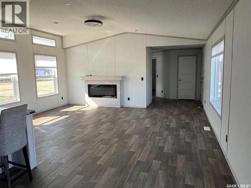 215 1St Street W, Meota, SK - Indoor Photo Showing Other Room With Fireplace