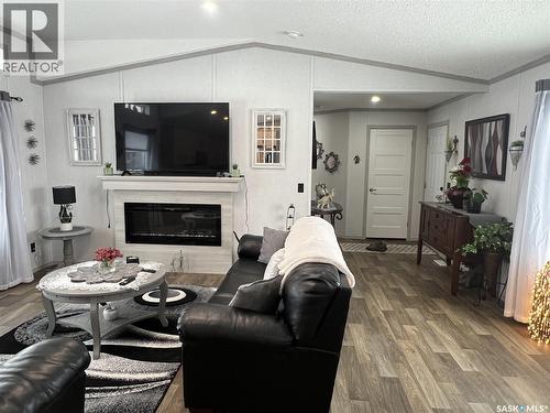 215 1St Street W, Meota, SK - Indoor Photo Showing Living Room With Fireplace