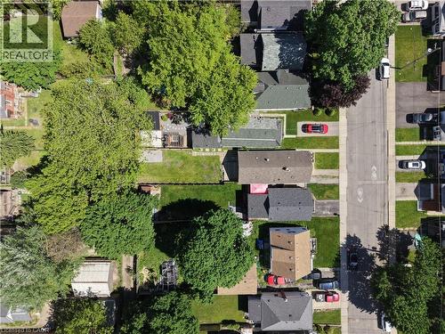Aerial perspective showcasing residential properties with established trees and green spaces - 92 East 24Th Street, Hamilton, ON - Outdoor With View