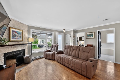 Salon - 995 Rue De Brétigny, Laval (Fabreville), QC - Indoor Photo Showing Living Room With Fireplace